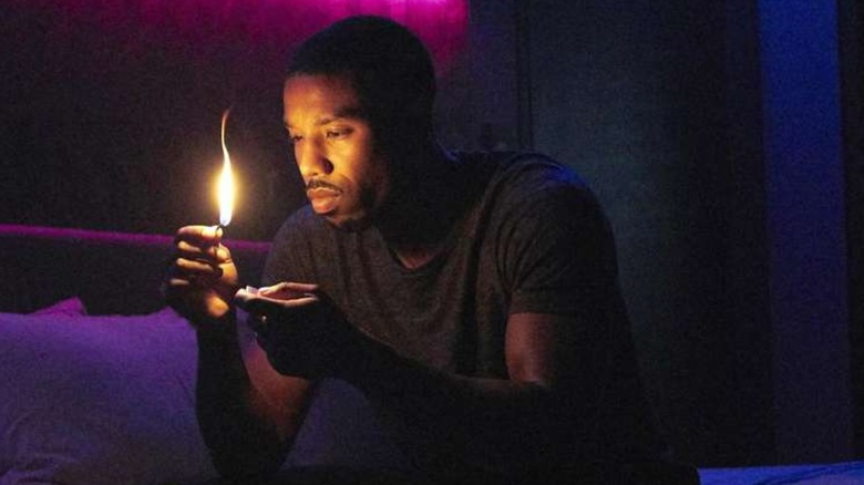 Guy stares at the fire and contemplates his choices in Fahrenheit 451
