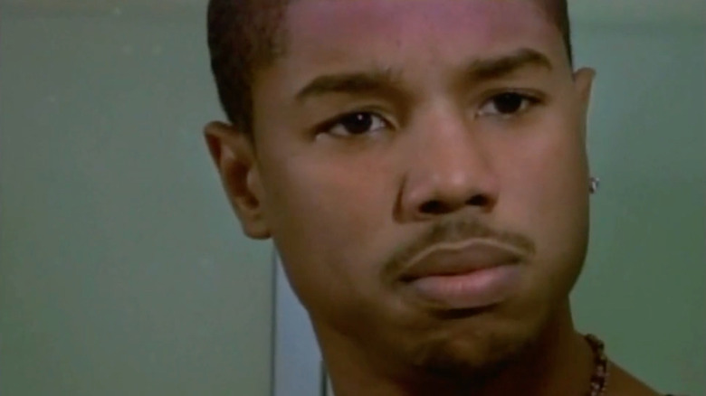 Michael B. Jordan as Nate Warren looking annoyed in The Assistants