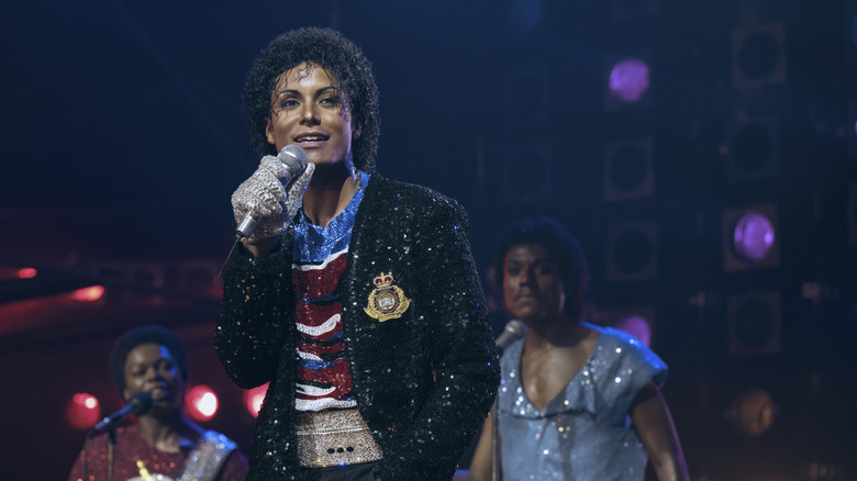 Michael Jackson sings on stage with his brothers in Michael