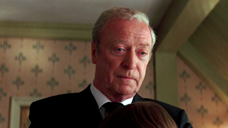 Michael Cain comforts a young Bruce Wayne in "Batman Begins"