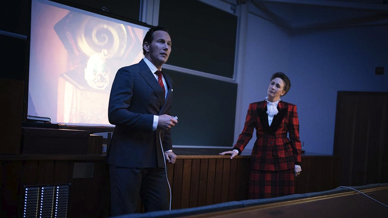 Ed and Lorraine Warren giving a lecture in The Conjuring: Last Rites