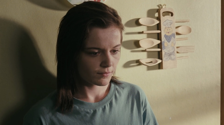 Katie Jarvis' Mia Williams stands in her kitchen in Fish Tank