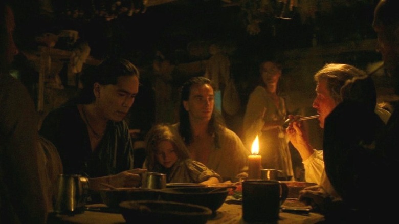 Last of the Mohicans Hawkeye with friends in candlelight