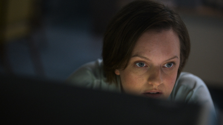 Elisabeth Moss looking intently at something in Shining Girls