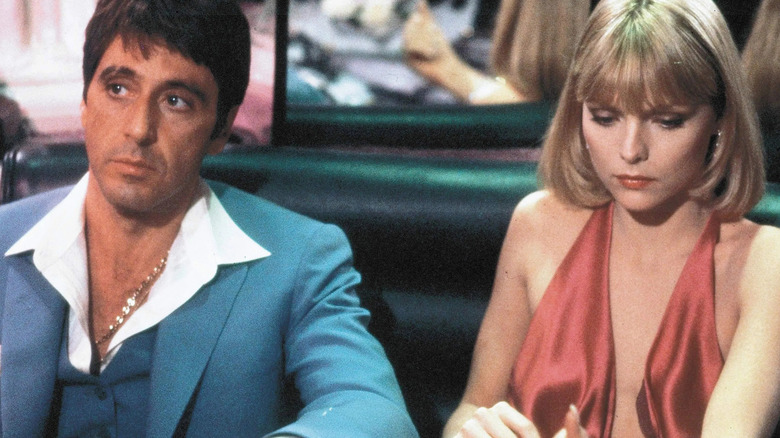 Al Pacino as Tony Montana with Michelle Pfeiffer's Elvira Hancock in Scarface