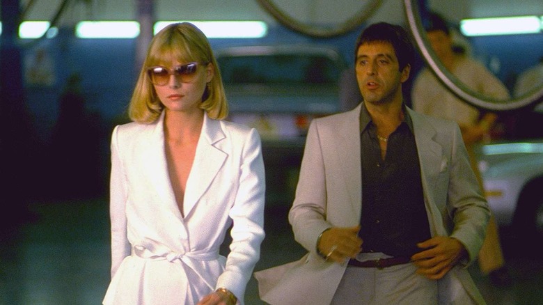 Michelle Pfeiffer's Elvira walking away from Tony's advances in Scarface