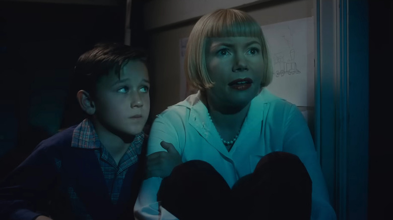 Mateo Zoryan Francis-DeFord and Michelle Williams in The Fabelmans