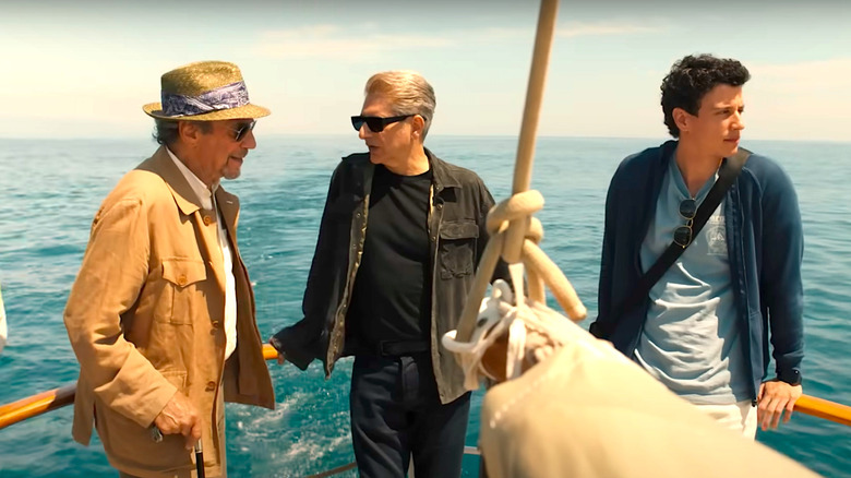 F. Murray Abraham, Michael Imperioli, and Adam DiMarco travel by boat in season 2 of The White Lotus