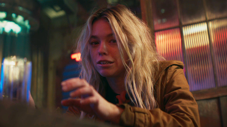 Milly Alcock as Kara looking bemused in Supergirl (2026)