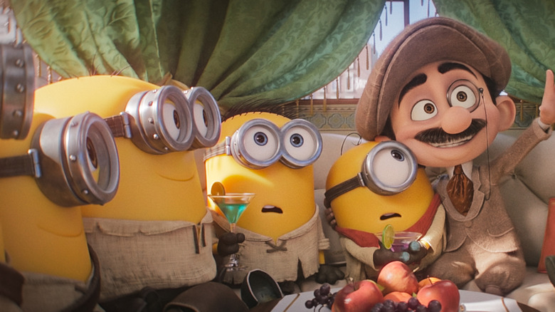 Film director Max wowing the Minions with promises of a big Hollywood life in Minions & Monsters