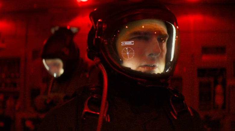 Ethan Hunt (Tom Cruise) preparing to jump out of a plane in Mission: Impossible - Fallout