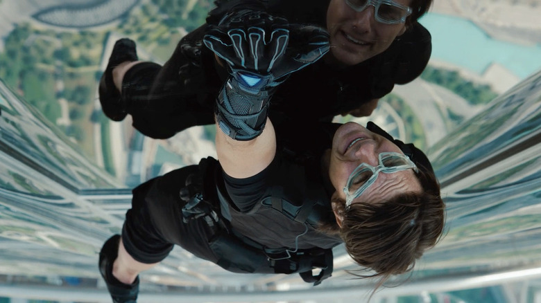 Ethan Hunt (Tom Cruise) scaling the Burj Khalifa in Mission: Impossible - Ghost Protocol
