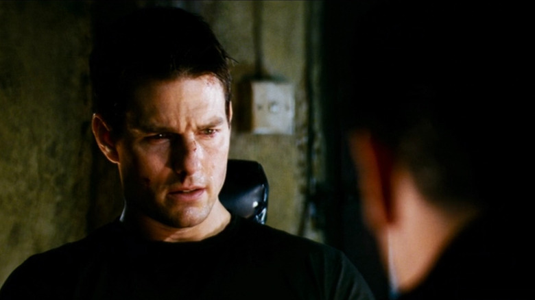 Ethan Hunt (Tom Cruise) tied to a chair in Mission: Impossible III