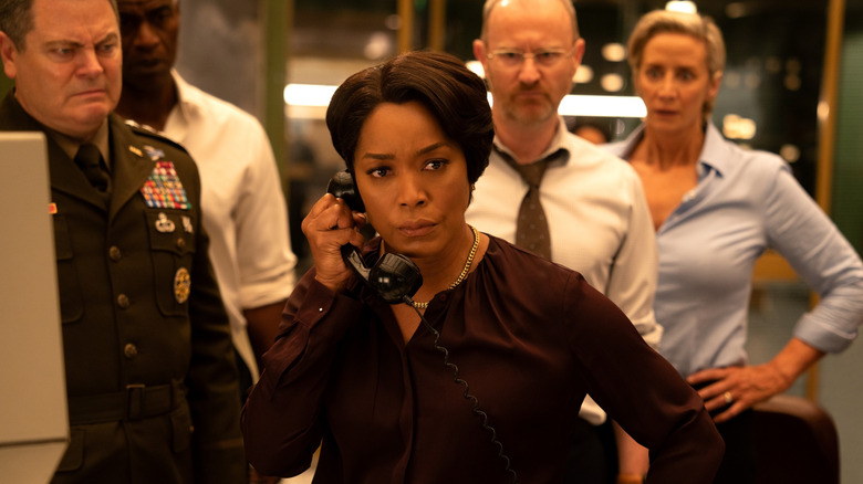 Nick Offerman as General Sidney, Charles Parnell as Richards, Angela Bassett as President Erika Sloane, Mark Gatiss as Angstrom, and Janet McTeer as Walters looking concerned in Mission: Impossible - The Final Reckoning