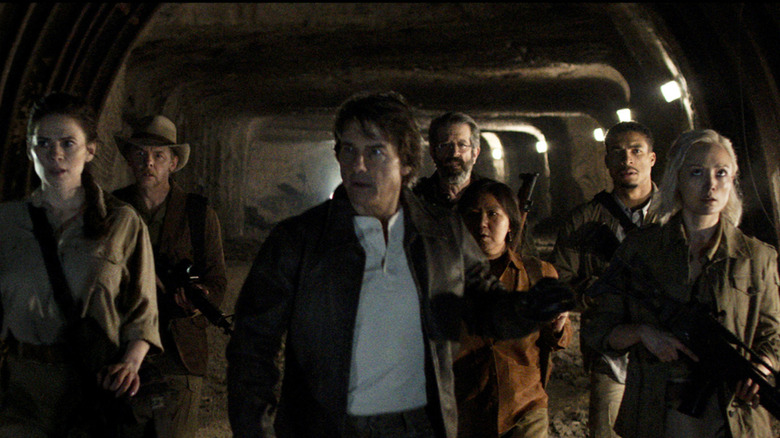 Hayley Atwell as Grace, Simon Pegg as Benji Dunn, Tom Cruise as Ethan Hunt, Rolf Saxon as William Donloe, Lucy Tulugarjuk as Tapeesa, Greg Tarzan Davis as Degas, and Pom Klementieff as Paris walking through the Doomsday Vault in Mission: Impossible - The Final Reckoning