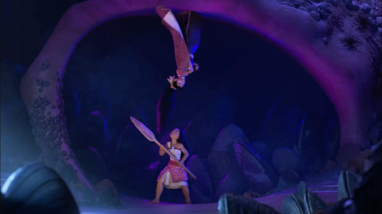 Moana looking up at Matangi inside the mysterious clam cave in Moana 2