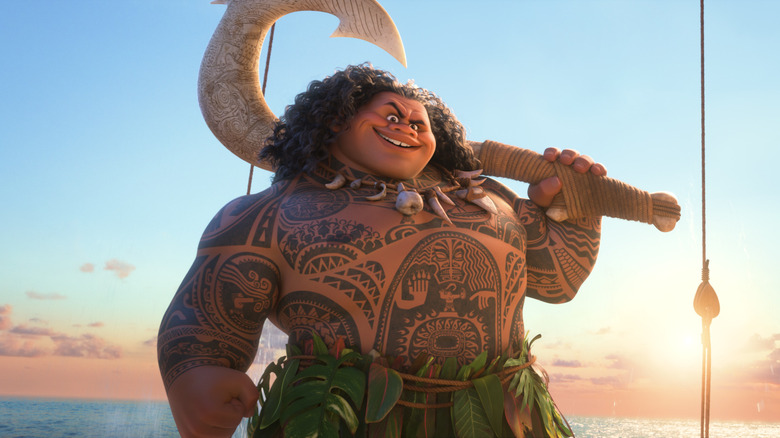Dwayne Johnson as Maui holding his hook in Moana 2