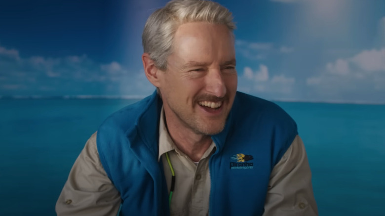 Mobius (Owen Wilson) in a seeming promo ad for a watersports company