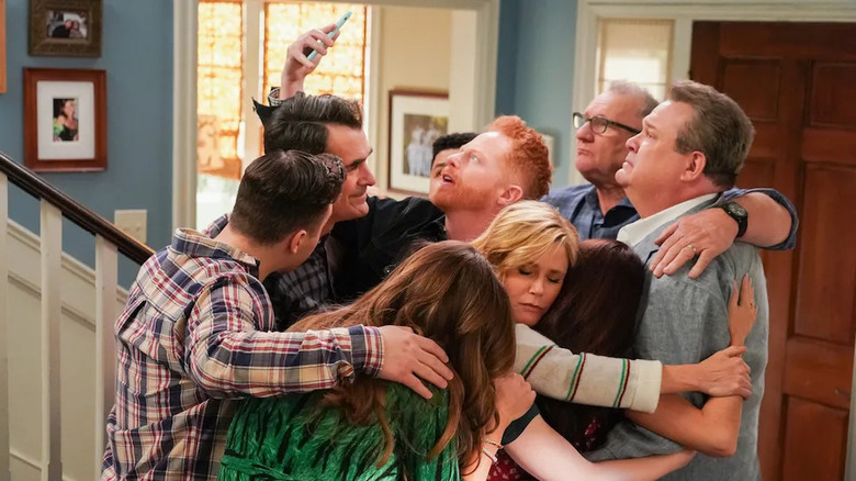 The Pritchett family unite for a group hug on Modern Family