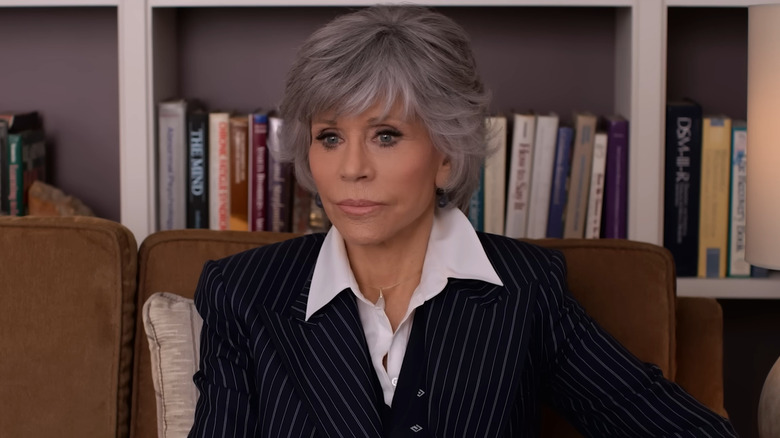Grace Henson sitting in striped blazer