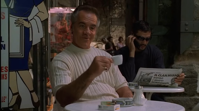 Paulie Walnuts holding teacup