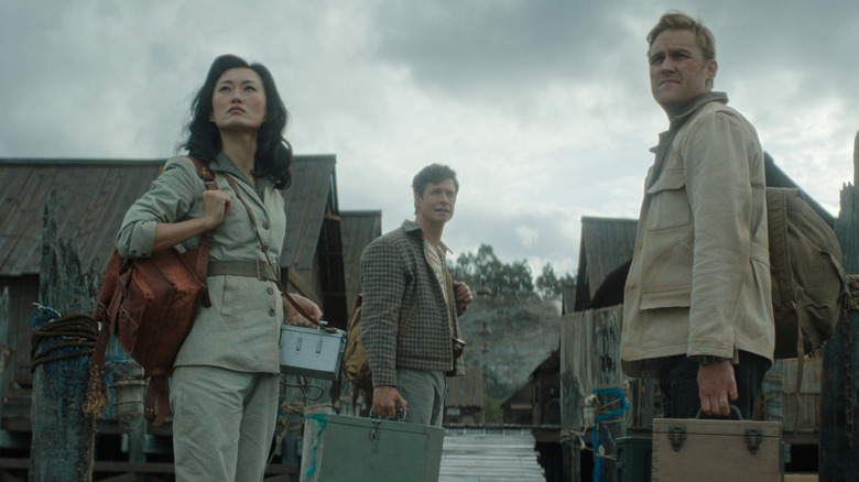 Mari Yamamoto as Keiko, Anders Holm as Bill, and Wyatt Russell as Lee in a seaside town in Monarch: Legacy of Monsters season 2