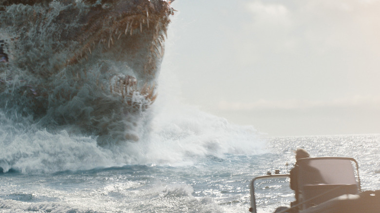 Titan X chasing Lee Shaw in a boat in Monarch: Legacy of Monsters season 2