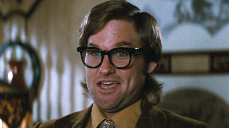 Kurt Russell is Jack Burton as Henry Swanson in Big Trouble in Little China