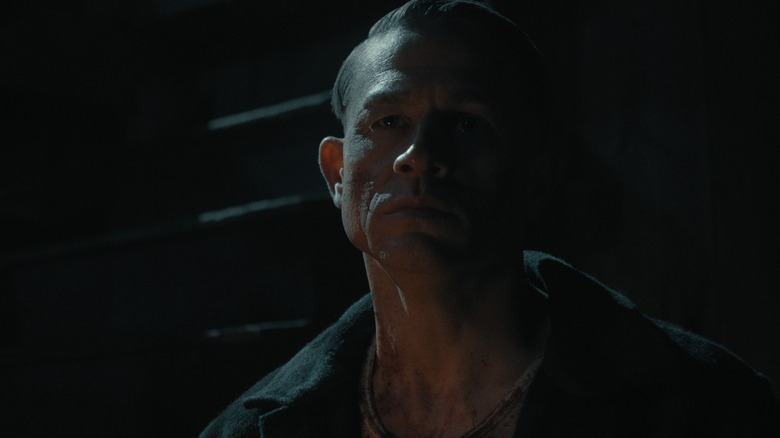 Gein looks menacing as he stares ahead in Monster: The Ed Gein Story