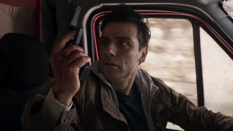 Marc Spector surprised by a gun