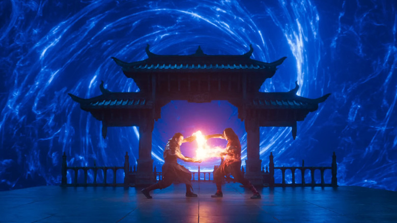 Max Huang as Kung Lao and Ludi Lin as Liu Kang facing off in Mortal Kombat II