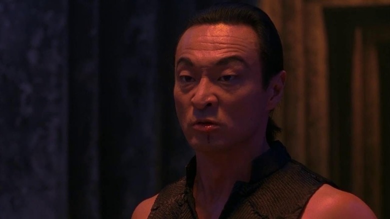 Shang Tsung (Cary-Hiroyuki Tagawa) glares with a bloody lip in Mortal Kombat (1995)