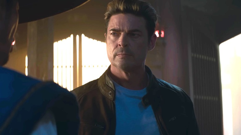 Karl Urban as Johnny Cage looks at Raiden (Tadanobu Asano) in Mortal Kombat II