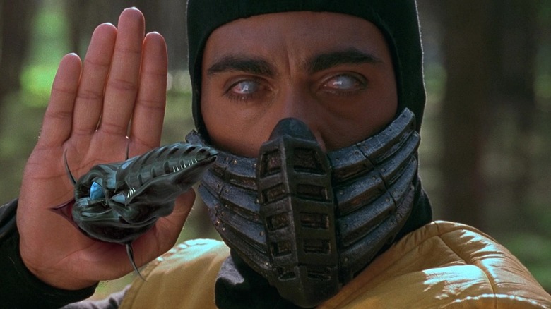 Chris Casamassa as Scorpion with his blade coming out of his hand in Mortal Kombat (1995)