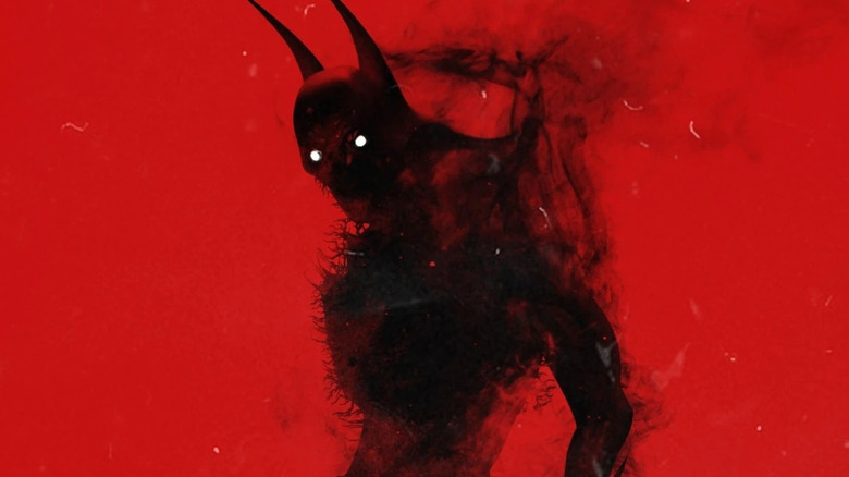 The Darkest Knight against a red background in DC Comics
