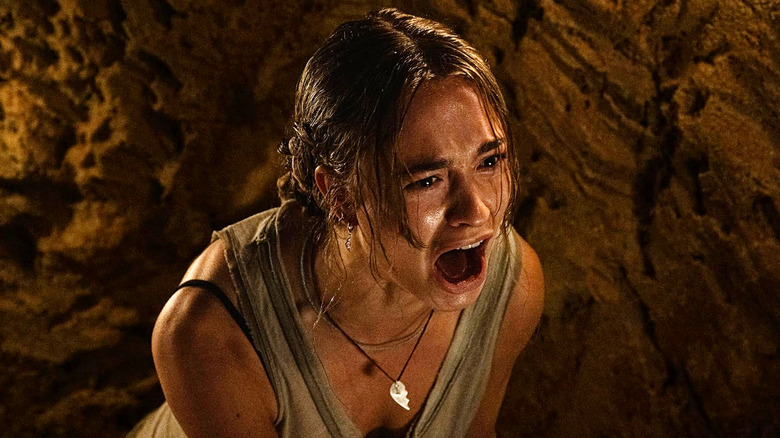 Lucy (Johnny Sequoyah) screaming in a dark tunnel in Primate