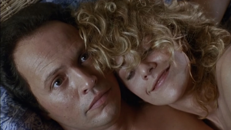 Meg Ryan's Sally Albright lays on Billy Crystal's Harry Burns in When Harry Met Sally