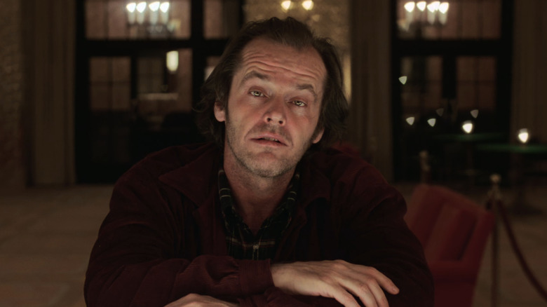 Jack Nicholson's Jack Torrance sits at a bar in The Shining