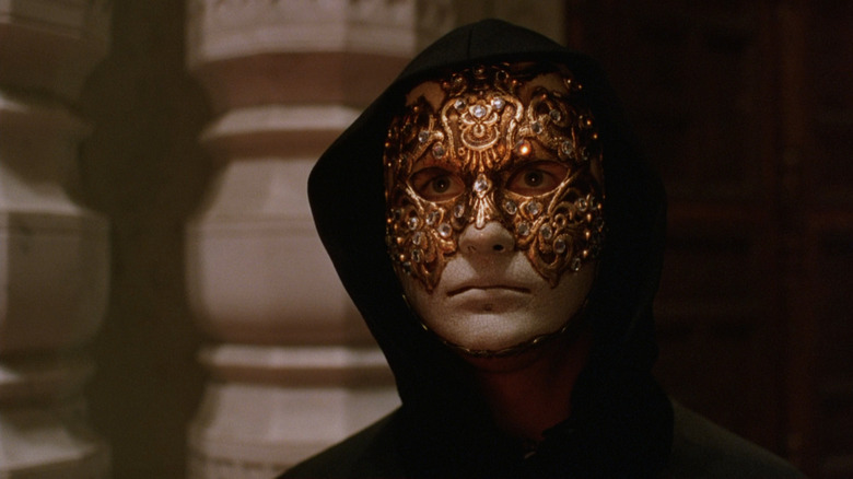 Tom Cruise in mask and hood