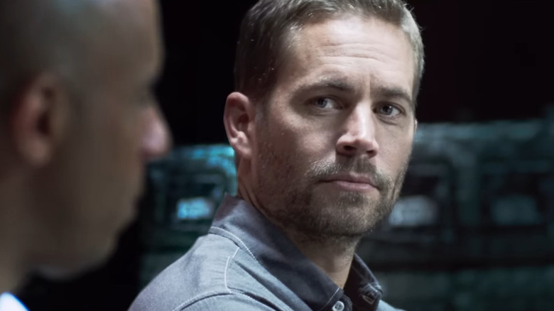 Brian (Paul Walker) looking at Dominic (Vin Diesel) in Furious 7