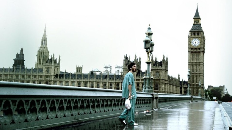 Cillian Murphy walks through deserted London