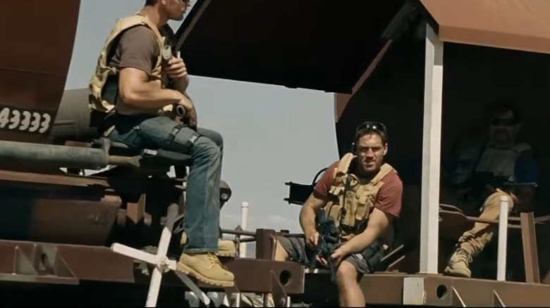 Men riding a train
