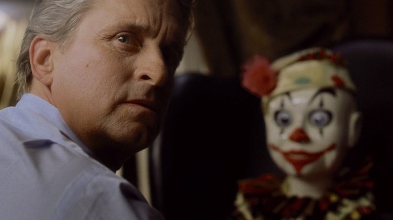 Nicholas Van Orton and a creepy doll