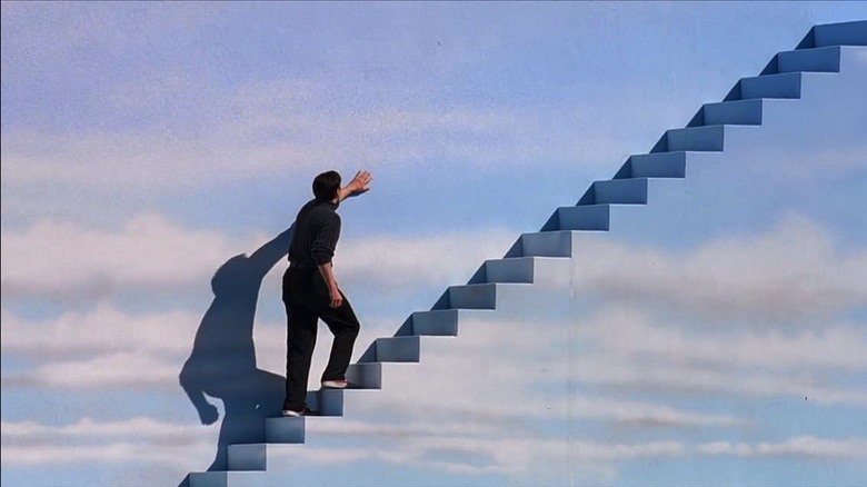 Truman Burbank walking in stairs