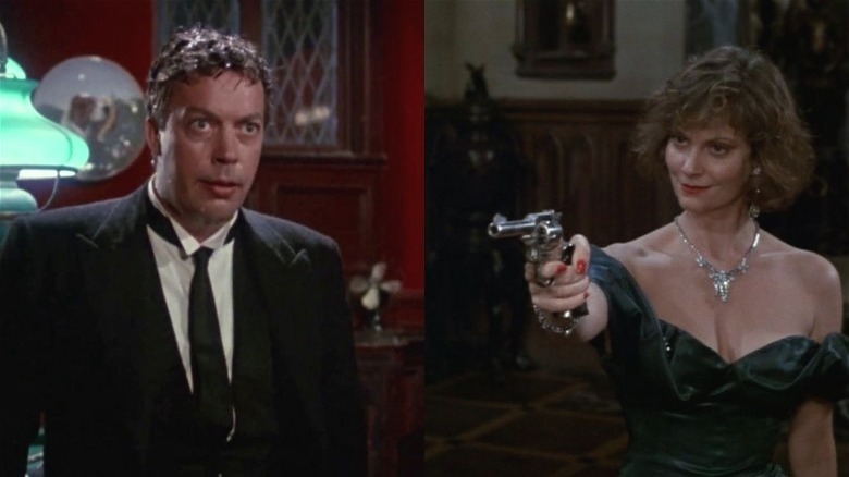 Miss Scarlett holds the butler at gunpoint