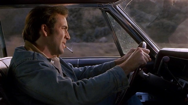 Nicolas Cage drives car