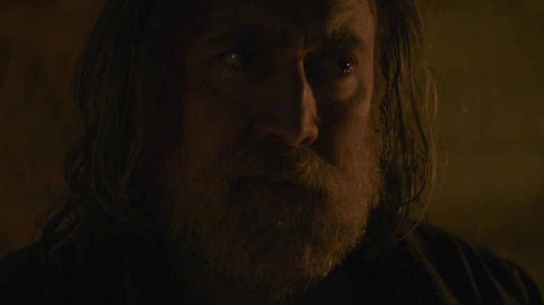 Nicolas Cage in Pig bloody bandage on nose