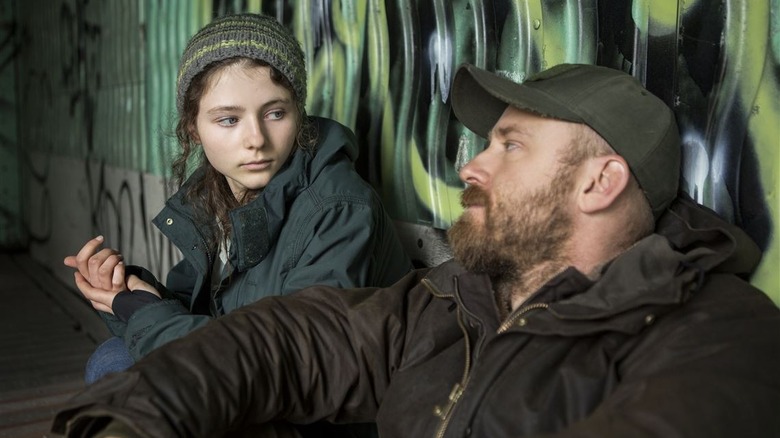 Thomasin McKenzie sits with Ben Foster