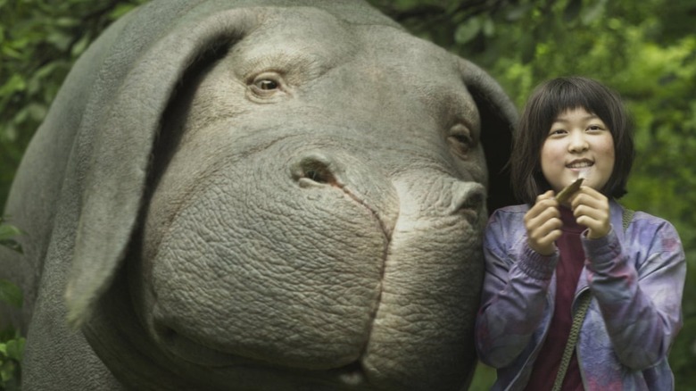 Giant pig and little girl
