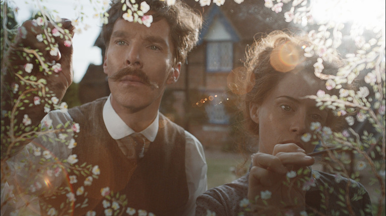 Benedict Cumberbatch Claire Foy look at flowers